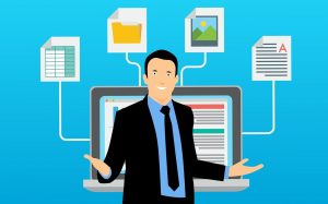 データ連携したPCと男性のイラスト
